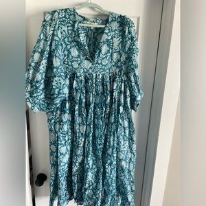 This is a beautiful handmade dress from India! Boutique Daughters of India